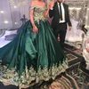 emerald green gold prom dresses