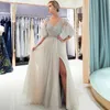 Niesamowite Silver Beaded Prom Dresses Sexy V Neck See przez Beżowy Tulle Suknie Wieczorowe Sweep Pociąg Kobiety Formalna Dress Party Dress Custom