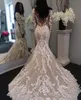 2020 Sexy Arabic Mermaid Wedding Dresses Appliques in pizzo Abiti a maniche lunghe Illusione Sheer Button Back Sweep Train Plus size Brida7996437