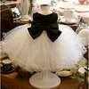 Bianco e nero abito di sfera delle ragazze di fiore abiti di sfera di Tulle con il vestito da Paillettes dalle ragazze di fiore vestito dalla festa nuziale reale Immagini