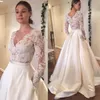 Spets långärmad bröllopsklänningar elegant en linje täckt knapp vintage brudklänningar billigt 2018 v-nackstrand plus storlek bröllopsklänningar