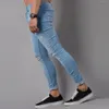 Pantaloni a matita da uomo Jeans strappati drappeggiati con fori per il ginocchio Jeans lunghi skinny Jeans blu alla moda elastici neri