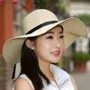 Cokk 여름 모자 여성용 Chapeau Femme Sun Hat 해변 파나마 밀짚 모자 큰 와이드 브림 블랙 리본 활 바이저 뼈 여성 모자