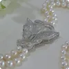 Vente chaude nouveau 2 rangées 7-8mm naturel blanc perle d'eau douce zircon accessoires papillon boucle fleur pendentif chandail collier bijoux de mode