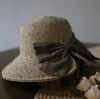 Женские летние шляпы Солнца средние поля соломенная шляпа с льняным бантом пляж путешествия стиль отдыха складной повседневная шляпа Сплит до краев Tophat QN