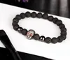 Nieuwe Mode 8mm Lava Stone Rode Ogen Diamond Skull Armband Reiki Healing Balancing Ronde Kralen Armband Unisex Gothic Armband