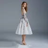 Paolo Sebastian 2018 Prom Dress Illusion Sheer Neck Manica lunga Viola 3D Applique Lunghezza tè Abiti da ballo Sexy Backless Evening G244w