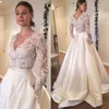 Vestidos de novia de manga larga de encaje Elegante Una línea Botón cubierto Vestidos de novia vintage Baratos 2018 Vestidos de novia de talla grande con cuello en V de playa