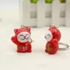 2018 Nyckelkedja Lovely Cartoon Maneki Neko Lucky Cat Mini Plastic Toy Keychain för Barngåva Purse Charms Pendant Key Ring