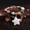 Mode färgad naturlig lava stenpärlor armband parfym eterisk oljediffusor armband stjärna charms tillbehör smycken kvinnor