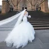 Robe de mariée sirène de haute qualité Dubaï sur mesure décolleté en V dentelle appliques manches longues robes de mariée avec train de balayage en tulle à plusieurs niveaux