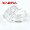 40 pz/lotto 2g Bottiglie Vuote Contenitori Cosmetici Jar Pot Box Piccoli Vasetti di Plastica Con Coperchi Campione Mini Crema Imballaggio Cosmetico