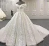 Sparkly bling bröllopsklänningar från axeln Sequined Fabric Ball Gown Wedding Dress Court Train Robe de Mariée Plus Storlek Brudklänningar