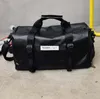 Duffel Bags Личные черные PU Женщины короткие ручки Большой Capactiy Travel Managing 36-55L