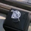 Nuovi arrivi professionali all'ingrosso Gioielli di lusso Argento sterling 925 Taglio a pera Topazio bianco CZ Diamante Wedding Heart Band Ring per le donne