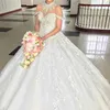 Luxuriöse Brautkleider mit Stehkragen, Kristallperlen-Applikation, durchsichtiges, kurzes Ärmel-Brautkleid, glitzerndes, modisches Tüll-Ballkleid-Hochzeitskleid