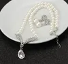 Stile caldo Versione coreana del popolare set di orecchini con collana di perle, set di gioielli da sposa, 2 pezzi di moda classica ed elegante