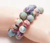 Mode Färgglada Handgjorda Bohemiska Beaded Strands Armband Floral Soft Clay Elastiskt Armband för Kvinnor Tjejer Nationella Smycken Partihandel