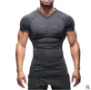 Mens sommar gym fitness bodybuilding t-shirt crossfit muskel manliga korta ärmar slim passform elasticitet skjortor snabba torra toppar