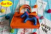 Bestkid DHL ¡Envío gratis! Bolsos de tamaño pequeño para niñas para bebés Niños Mini cuero Totes Bolsas para niños Bolsas para niños pequeños Bolso de moneda encantadora BK060