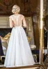 Tulle Ivory Beach Suknie ślubne Klejnot Neck Koronki Aplikacje Sheer Backless Wedding Suknie Tanie Niestandardowe Długość Piętra Suknia Ślubna