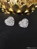 orecchini con lettera orecchini di lusso con diamanti a forma di cuore lega alta lucida MK chiodo dell'orecchio5849543