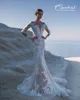 2019 Abiti da sposa a sirena con gonne staccabili Sheer Jewel Neck Appliqued in pizzo Sweep Train Abito da sposa a maniche lunghe Abito da sposa modesto