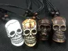 12 pcs YQTDMY Whole Fashion jewelry Carved Skull Charm Necklace Jewelry Wood Beads Rope Adjustable45912097845473