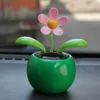 Whole MUQGEW New Colorful Solar Powered Dancing Flower Swinging Animated Dancer Toy Car Decoration Car Solar Flowers Accessor1870932