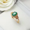 MGFAM 245R Zielone pierścienie biżuteria dla szlachetnych kobiet 18K Gold Plated Oval Oval Cubic Cyrron Lead 8698738