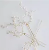 女性のヘアクリップの金属のバレットクリスタルラインストーンの花のヘアピンのヘアピンの髪のピンのための4ピースの結婚式のブライダル花嫁のヘアアクセサリー