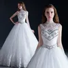 Perlenbesetztes Kristall-Tüll-Ballkleid-Hochzeitskleid Vintage 2019 Juwelenhals-Brautkleid mit offenem Rücken