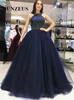 Abiti da sera di lusso con perline di perle per le donne Abiti lunghi da cerimonia blu navy Abiti da ballo in tulle con sbuffo Abiti da festa per eventi