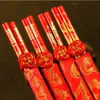 Gratis frakt New Wood kinesiska ätpinnar,trycker både Double Happiness och Dragon,Bröllopsätpinnar favor