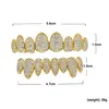 L'oro reale 18K Denti Grillz Caps fuori ghiacciato zircone 8 Denti Sopra Sotto Vampire Fangs Dental Grill Set all'ingrosso