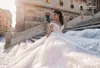 2019 Vestidos de novia de campo modestos Fuera del hombro Apliques Una línea Tren de barrido Vestido de novia de encaje magnífico Tallas grandes Vestido De Novia Puffy