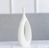 Cerâmica branco moderno criativo vaso de flores para casa decoração vasos para decoração de casamento estatuetas de porcelana TV gabinete decoração