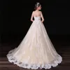 Correas espaguetis simples Una línea Vestidos de novia Encaje Sin mangas Cuello en V Champagne Plique Tull Ilusión Vestidos de novia Vestidos de novia HY4195