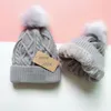 2023 nouvelle marque de luxe bonnets élégant épaississement tricoté chapeaux casquette hiver décontracté casquette femmes pompon crâne casquettes cadeau de noël