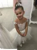 High 2018 Farinha baixa para casamentos Capinho de pescoço de gola lacta Sashes Tulle Tulle Pearls Princess Girls Pageant Dresses