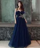 2019 Stunning Navy Blue Prom Dresses Spaghetti Straps Ruffles Neck Lace Appliques A-line Evening Party Gowns Floor Length with Sash