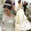 2018 Pas Cher Vintage Une Ligne Robes De Mariée Hors Épaule Illusion Manches Longues Appliques Dentelle Perlée Plus La Taille Ceintures Satin Formelle Robe De Mariée