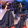 Vestido de fiesta negro personalizado Vestidos de noche Cuello alto Vestidos de celebridades de la alfombra roja con marco de lazo 2018 vestidos nigerianos festa Tren largo