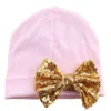 Forniture premaman Cappello per neonato Beanie Cappello in maglia con fiocco in paillettes carino Primavera Autunno Cotone 0-3 mesi