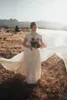 Los más nuevos vestidos de novia modestos de gasa de encaje boho con mangas casquillo Una línea de botones Volver Informal País Rústico LDS Vestidos de novia con mangas