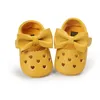 Ins 19colors Wählen Sie Baby Mokassins Liebe Herz Bogen Infant Prewalker PU-Leder-Kinder aushöhlen Schuhe für Jungen Mädchen weiche Anti-Rutsch-Sohle