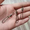 200pcslot swivels de pesca inoxidável Snap água doce Rolamento de água salgada Girando com TShape Snap Snap Redução Rápula