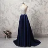 Arrivo gioiello 2018 Nuovi abiti da sera senza maniche con applique Blu scuro scuro A-line Prom Sheer Back Abiti formali su misura Eleganti