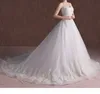 Superbes robes de mariée robe de bal tribunal train robe de mariée perles majeures paillettes lacets dos tulle avec dentelle appliques robes de mariée ivoire