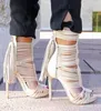 Women Sexy Fashion Open Toe Black White Thin Straps Cross Short Gladiator Boots Cut-out Super High Heel Tassels Ankle Booties